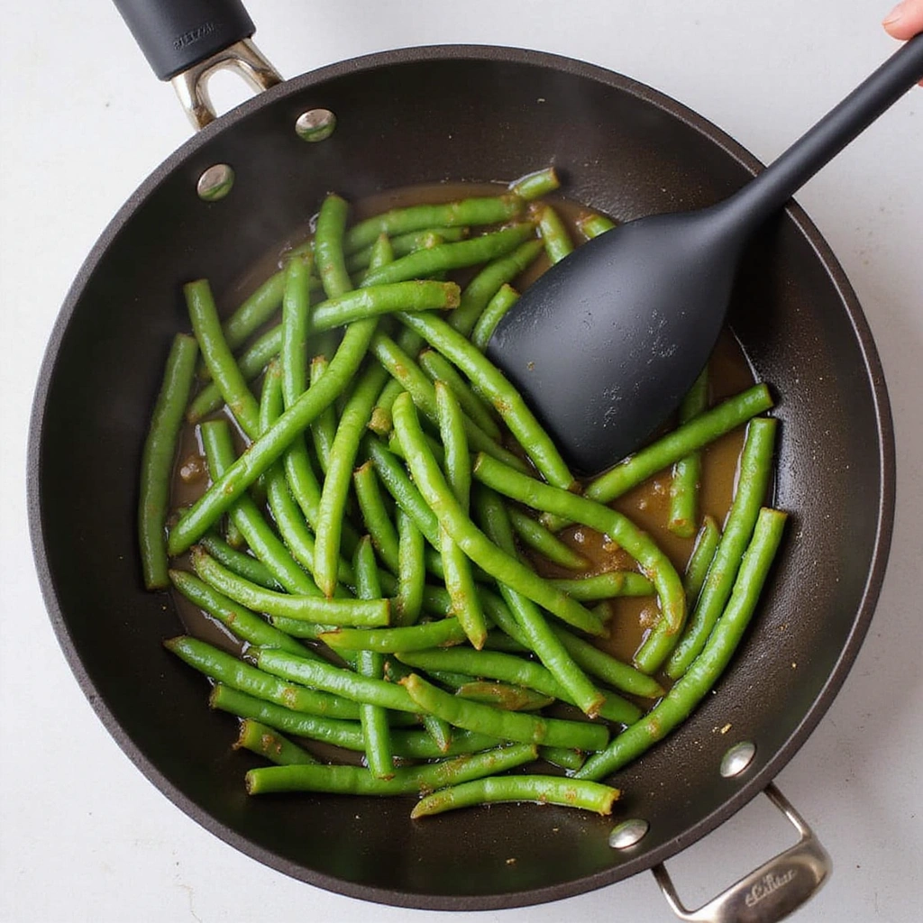 Chinese Green Bean Recipe Asian Style Crispy and Savory 6 Chinese Green Bean Recipe Asian Style Crispy and Savory - Step 6: Incorporate the Sauce